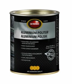 Schwarze und silberne Metall-Dose Autosol Aluminium Politur mit goldfarbenem Deckel.