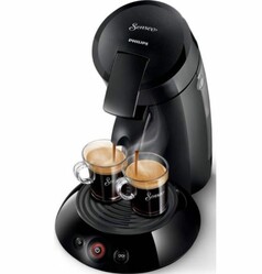 Schwarze Senseo Philips Kaffeepadmaschine, die Kaffeetassen bef�llt.