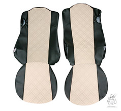 Ein Paar creme-schwarze Kunstleder-Sitzbez�ge mit gewaffeltem Mittelteil f�r LKW.
