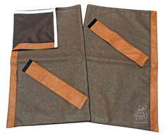 Braune LKW-Innenraumgardinen aus Kunstleder und Wildlederimitat, mit hellbraunen Kanten und R�ckhalteb�ndern.