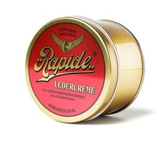 Goldene Dose Rapide Lederfett mit rotem Etikett und goldenem Schriftzug f�r Lederpflege.