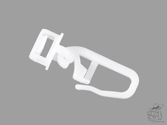 Ein wei�er Kunststoff-Klickgleiter f�r LKW-Gardinen.