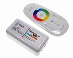 Wei�er LED Controller und Touch-Fernbedienung f�r RGB-LEDs. Die Fernbedienung hat ein farbiges Touch-Rad.