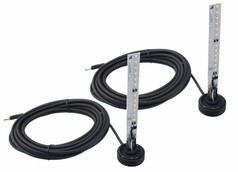 Set von LED-Leuchtmitteln f�r LKW-Puppen. Graue Platinen mit gelb/wei�en LEDs, schwarze Basen und lange schwarze Kabel.