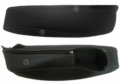 Paar schwarze Kunstleder Armlehnenbez�ge mit hellen N�hten. Einer zeigt einen ge�ffneten Rei�verschluss.